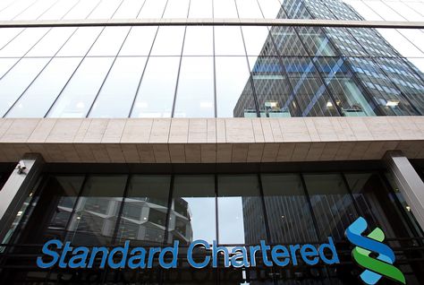 Stanchart profit rises 11%